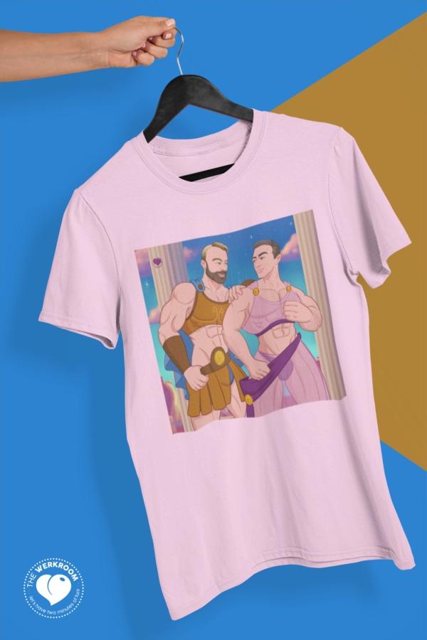 mockup of a hand holding a t shirt in a colorful background ()